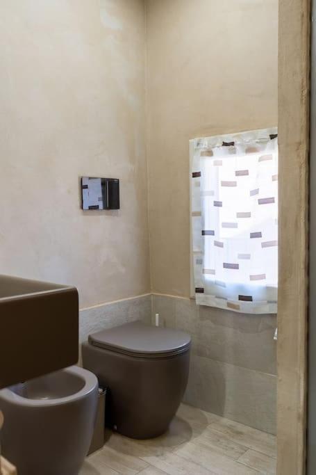 Casa Vacanze L'Angolo Fiorito เบตตอลเล ภายนอก รูปภาพ